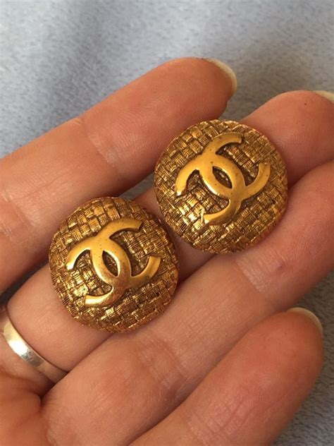 chanel earrings fake vs real|authentic Chanel logo earrings.